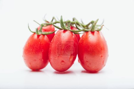 Photo for Cluster of Cherry Tomatoes in Frontal Close-Up Detail - Royalty Free Image