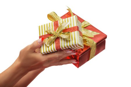 Photo for Woman's hands holding gifts against a white background - Royalty Free Image