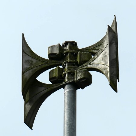 An old-fashioned but still functioning civil defense siren in a small German village, which must warn citizens of impending danger. In Germany these alarms were considered unnecessary after 1990.