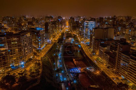 Photo for Aerial view of the Miraflores district of Lima, the capital of Peru, at night. - Royalty Free Image