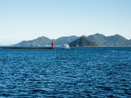 Scenic view from Hiroshima port at sunset with Togeshima and Etajima islands in the background