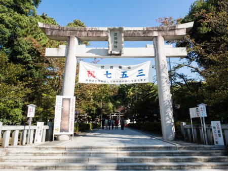 Photo for Kofu, Yamanashi prefecture, Japan - October 26, 2017: Torii gates at the entrance to Takeda Shrine on the grounds of former Tsutsujigasaki mansion - Royalty Free Image