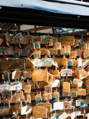 Photo for Kofu, Yamanashi prefecture, Japan - October 26, 2017: Ema plaques at Takeda Shrine, a Shinto shrine dedicated to the spirit of Takeda Shingen - Royalty Free Image