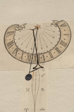 Photo for Thun, Switzerland, February 13, 2023 Historic old sundial painted on a wall - Royalty Free Image