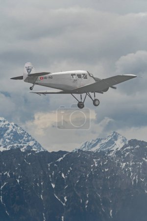 Photo for Rhine Valley, Saint Gallen, Switzerland, May 20, 2023 HB-RIO Junkers F13 rebuilt nostalgic propeller airplane performance during an air show seen from the top of the mount hoher Kasten - Royalty Free Image
