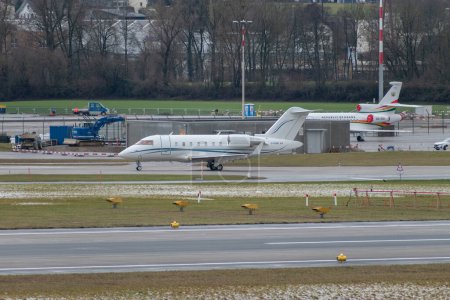 Photo for Zurich, Switzerland, January 17, 2024 C-FCDE Skyservice Business Aviation Bombardier Challenger 605 aircraft is taxiing during the world economic forum in Davos - Royalty Free Image