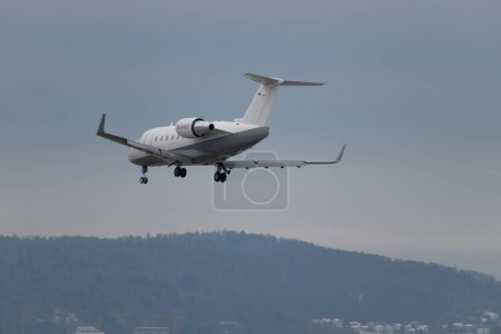 Photo for Zurich, Switzerland, January 15, 2024 D-AAAY Air Independence Bombardier Challenger 604 aircraft is landing on runway 14 during the world economic forum in Davos - Royalty Free Image