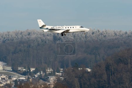 Photo for Zurich, Switzerland, January 14, 2024 YU-SPB Air Pink Cessna 560XL Citation XLS aircraft on its final approach to runway 14 during the world economic forum in Davos - Royalty Free Image
