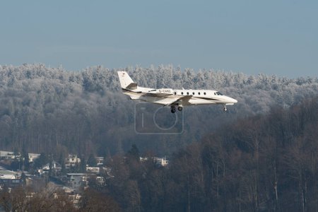 Photo for Zurich, Switzerland, January 14, 2024 D-CANG Vista Jet Cessna 650XL Citation XLS+ aircraft on its final approach to runway 14 during the world economic forum in Davos - Royalty Free Image
