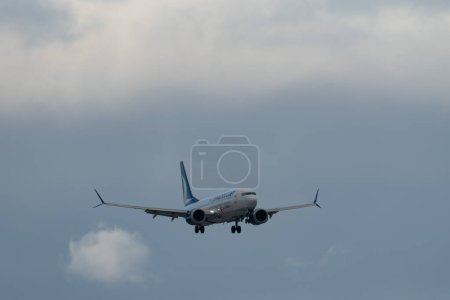 Photo for Zurich, Switzerland, January 15, 2024 TC-LAK Anadolu jet Boeing 737-8 MAX aircraft is landing on runway 14 - Royalty Free Image