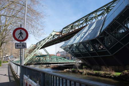 Foto de Wuppertal Suspension Railway train in Germany. The unique electric monorail system is Wuppertals landmark. North Rhine-Westphalia, High quality photo - Imagen libre de derechos