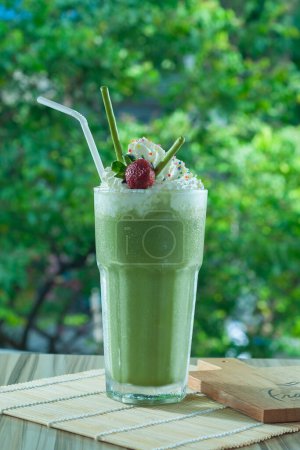 Iced green tea with Creamy Float served in glassware