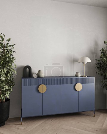 Modern interior showcases a blue sideboard with gold details, complemented by a lush indoor plant and minimalistic decor
