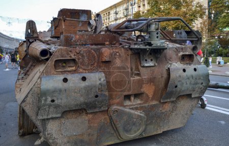 Photo for Destroyed as a result of an artillery strike BTR-82A armored personnel carrier of russian invaders on Khreshchatyk Street in the center of Kyiv, the capital of Ukraine - Royalty Free Image