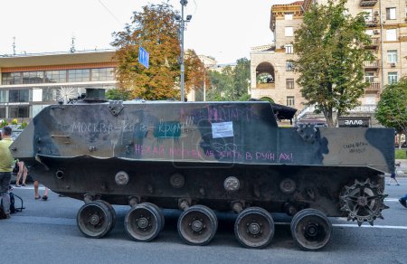 Photo for Destroyed russian BTR-MD amphibious armored personnel carrier in downtown Kyiv, at Khreshchatyk Street before Independence Day of Ukraine - Royalty Free Image