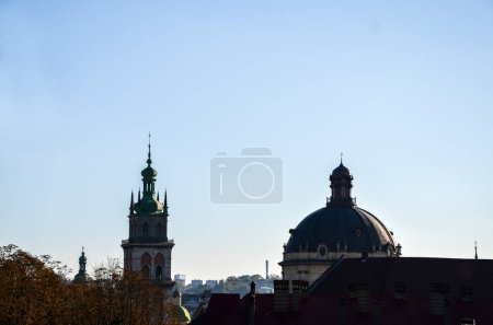 Photo for View to dome of the Dominican Cathedral, Korniakt Tower of the Assumption Church at the historic center of Lviv, on a sunny autumn day - Royalty Free Image