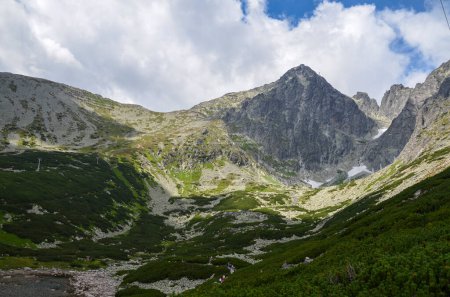 Photo for Skalnate pleso at the lowest corrie of the Rocky Valley and peak of Lomnicky Stit at the National park High Tatras, Slovakia - Royalty Free Image