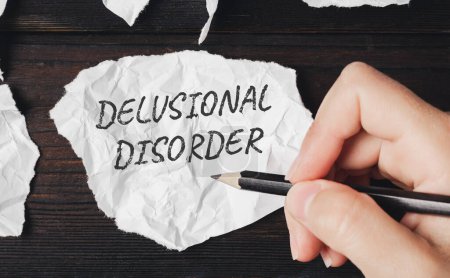 Photo for A piece of paper with the inscription delusional disorder. Delusional disorder is a mental illness. High quality photo - Royalty Free Image