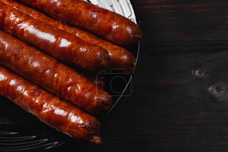 Photo for Fried sausages. Grilled sausages. BBQ sausages on a plate. High quality photo - Royalty Free Image
