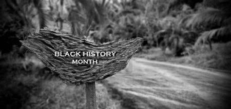 Photo for Black History Month in real life, with white writing on wooden board retro landscapes nature in countryside style. - Royalty Free Image