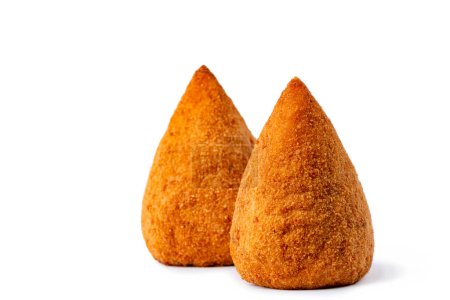 Isolated conical-shaped arancini. Italian rice balls that are stuffed, coated with breadcrumbs and deep fried.  Filled with ragu, mince meat, caciocavallo cheese and green peas. Sicilian food.