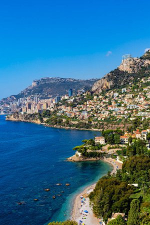 Photo for High angle view of Monaco, Monte Carlo,  from Roquebrune, France. Panoramic view. Summer 2022. Vertical image. - Royalty Free Image