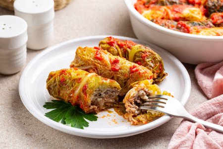 Stuffed savoy cabbage with beef meat and rice in a tomato sauce. , 