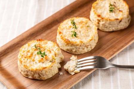 Photo for Vegetable flans or sformatino, or vegetable muffins made with cauliflower, leek, egg, ricotta and parmesan cheese. Monoportion appetizers. - Royalty Free Image