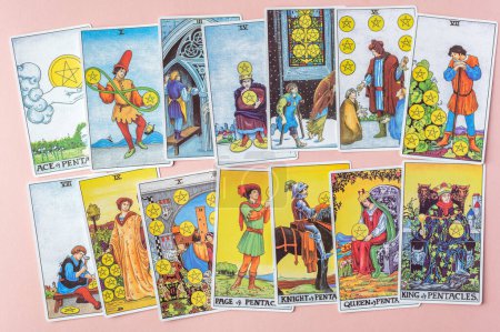 Photo for London, UK: 6 January, 2023: Minor Arcana - Suit of Pentacles of Tarot Card of Rider Waite deck on pink background - Royalty Free Image