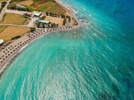 Photo for Aerial birds eye view drone photo beach on Rhodes island, Dodecanese, Greece. Panorama with nice lagoon and clear blue water. Famous tourist destination in South Europe - Royalty Free Image