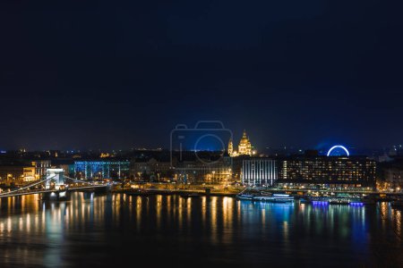 Photo for Night view of Budapest. Panorama cityscape of famous tourist destination with Danube and bridges. Travel illuminated landscape in Hungary, Europe. - Royalty Free Image