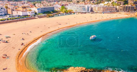 Photo for Sea landscape Badia bay in Tossa de Mar in Girona, Catalonia, Spain near of Barcelona. Ancient medieval castle with nice sand beach and clear blue water. Famous tourist destination in Costa Brava - Royalty Free Image