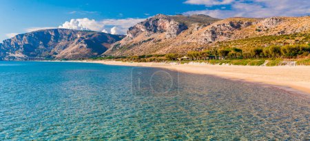 Photo for Panoramic sea beach landscape near Gaeta, Lazio, Italy. Nice sand beach and clear blue water. Famous tourist destination in Riviera de Ulisse. Bright sunny light and sunset. - Royalty Free Image