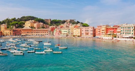 Photo for Sea aerial landscape in Sestri Levante, Liguria, Italy. Scenic fishing village with traditional houses and clear blue water. Summer vacation rich resort with picturesque harbour and nice sand beach - Royalty Free Image