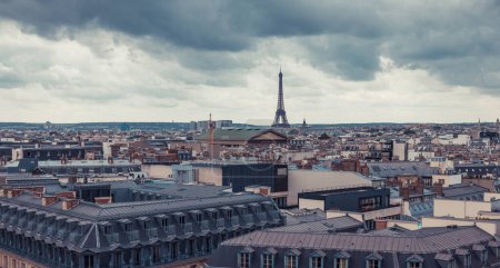Photo for Panoramic cityscape view of Eiffel Tower in Paris, France, Europe. Eiffel Tower is the symbol of Paris. Famous tourist architecture destination. View of postcard in Paris - Royalty Free Image