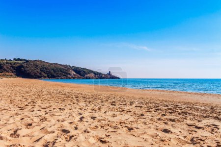 Photo for Panoramic sea beach landscape near Gaeta, Lazio, Italy. Nice sand beach and clear blue water. Famous tourist destination in Riviera de Ulisse. Bright sunny light and sunset. - Royalty Free Image