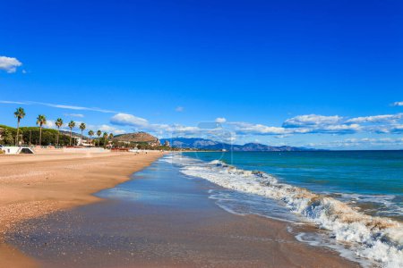 Photo for Panoramic sea landscape with Terracina, Lazio, Italy. Scenic resort town village with nice sand beach and clear blue water. Famous tourist destination in Riviera de Ulisse - Royalty Free Image