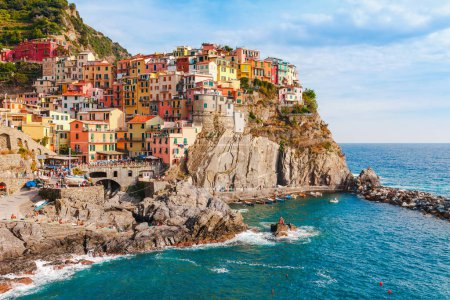 Photo for Sea landscape in Manarola village, Cinque Terre coast of Italy. Scenic beautiful small town in the province of La Spezia, Liguria with traditional houses. Famous tourist destination - Royalty Free Image