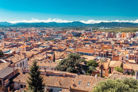 Photo for Top aerial view on Girona, Catalonia, Spain. Scenic and colorful ancient town. Famous tourist resort destination, perfect place for holiday and vacation. - Royalty Free Image