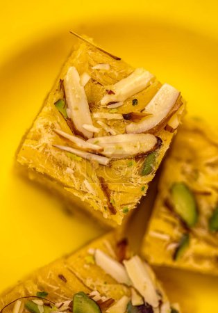 Indian Special Traditional Sweet Food Soan Papdi Also Know as Son Roll, it is a popular Indian Dessert.