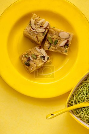 Photo for Indian Special Traditional Sweet Food Soan Papdi Also Know as Son Roll, it is a popular Indian Dessert. - Royalty Free Image
