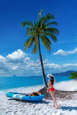 Photo for Tourist walking on tropical beach at Koh yao yai island, Thailand. - Royalty Free Image