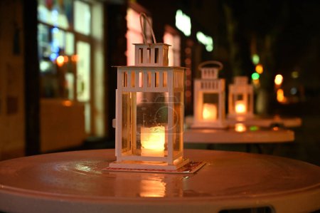 Photo for Lanterns, evening city lights blur background - Royalty Free Image