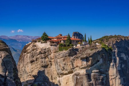 Photo for The Holy Trinity Monastery (Agia Triada) at Meteora is one of the most photographed monuments in Kalambaka in Greece - Royalty Free Image