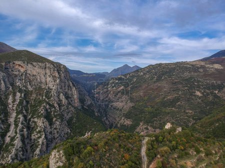 Photo for Amazing view over ridomo gorge in mountainous Mani area. At bottom rignt Prophet Helias traditional christian chapel in Mani, Messenia, Peloponnese, Greece - Royalty Free Image