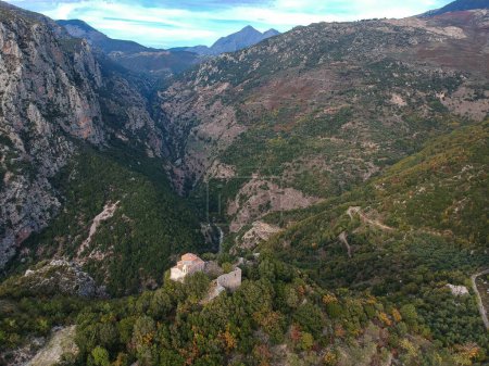 Photo for Amazing view over ridomo gorge in mountainous Mani area. At bottom rignt Prophet Helias traditional christian chapel in Mani, Messenia, Peloponnese in Greece - Royalty Free Image