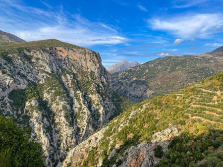 Photo for Natural scenery from the famous Ridomo gorge in Taygetus Mountain. The Gorge is deep and rich in geomorphological formation elements located near Kentro Avia and Pigadia Villages in Mani area, Messenia, Greece - Royalty Free Image