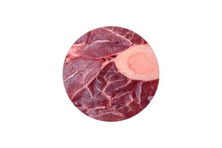 Foto de Fresh raw beef steak with bone or ossobuco with salt, spices and herbs on dark concrete background - Imagen libre de derechos