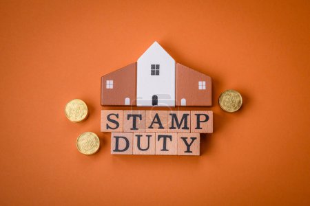 Photo for The inscription Stamp Duty made of wooden cubes on a plain background. Can be used for your design - Royalty Free Image