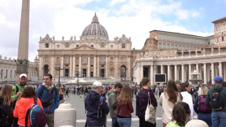 Photo for Europe, Italy, Rome 2023 - tourists and Catholic Christian faithful visit St. Peter's Square, seat of the Vatican and the residence of Pope Francis - tourist attraction and sightseeing - Royalty Free Image